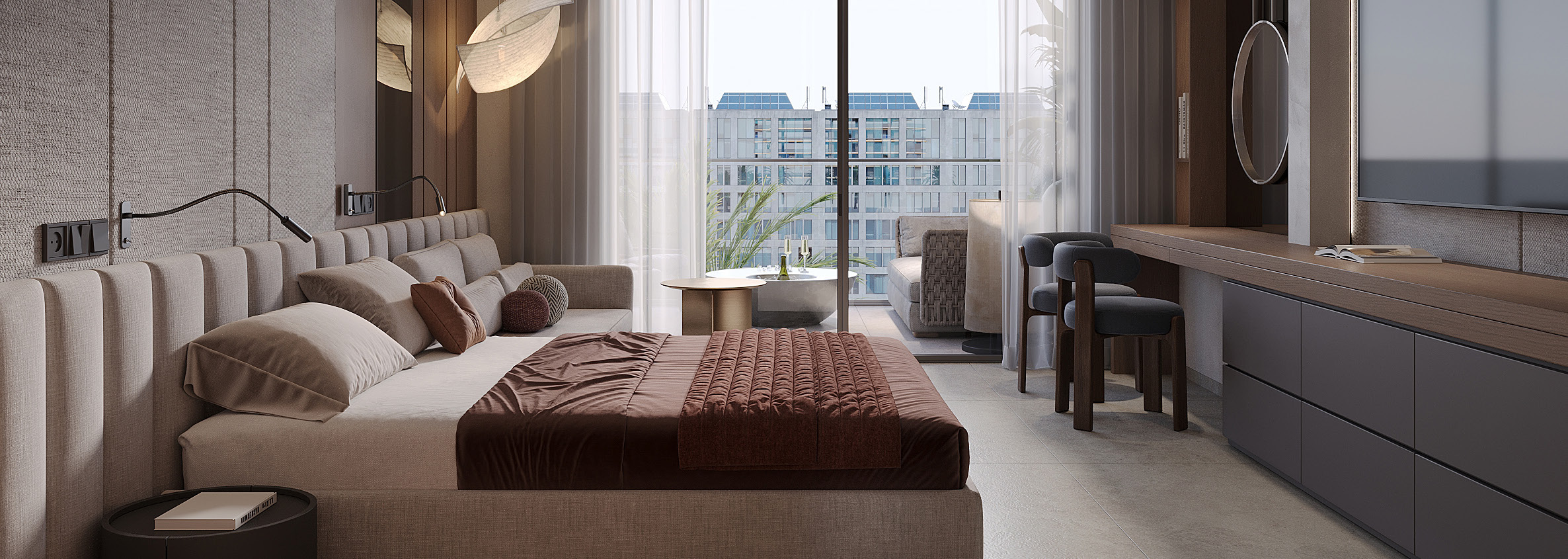 Luxe Studio interior with layered neutral tones and balcony sea view